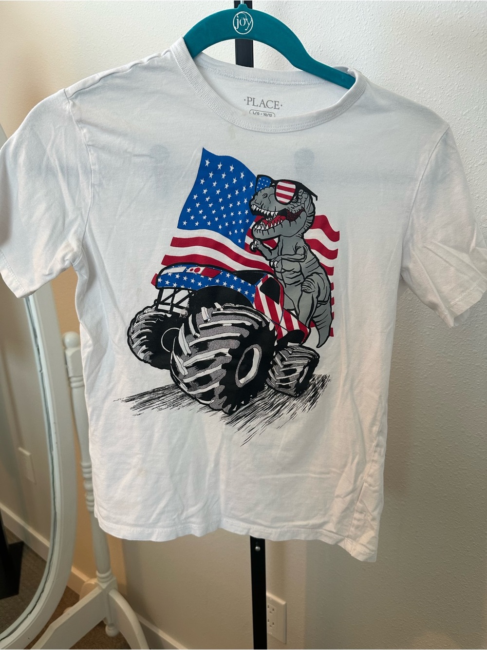 Place White Tee with American Flag Monster Truck & T‑Rex Graphic